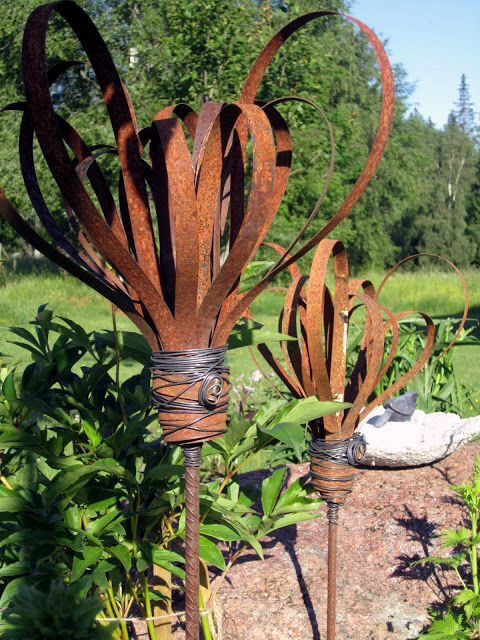 Rusty bands made into garden art