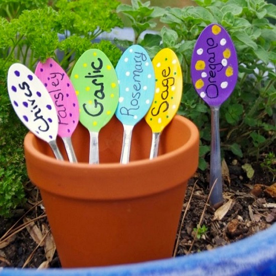 The spoons, once they've served their purpose, can be repurposed in the garden. First, flatten the spoon with a hammer.