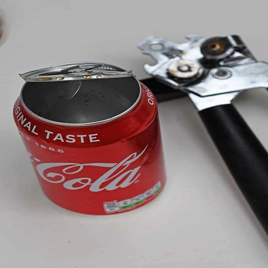 Using a can opener, cut the top of an empty Coke can like this