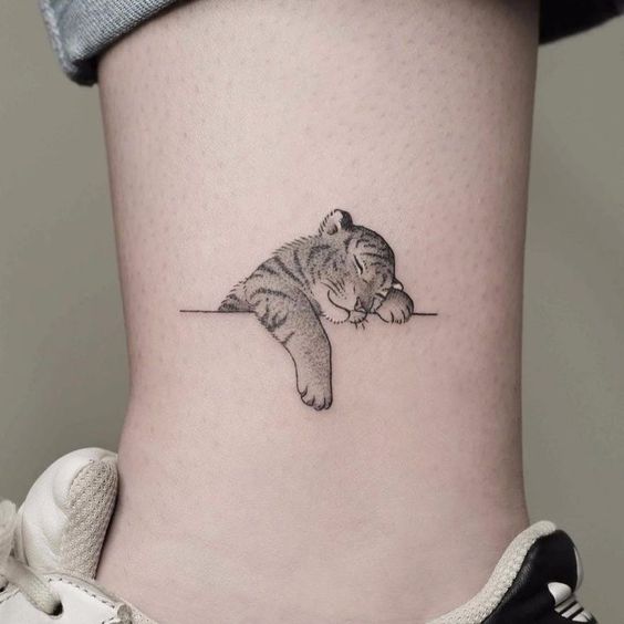 a small animal tattoo