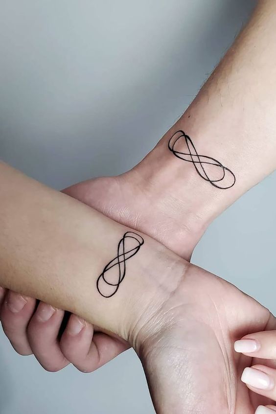 a small infinity symbol tattoo