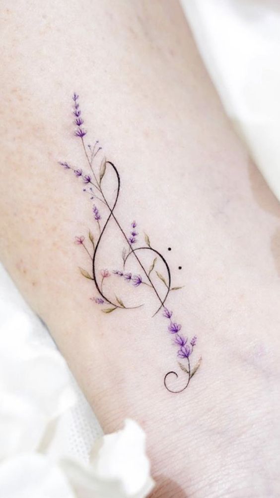 a small music note tattoo